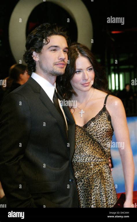 Actor Steven Strait And His Wife Lynn Collins Pose Ahead Of The World