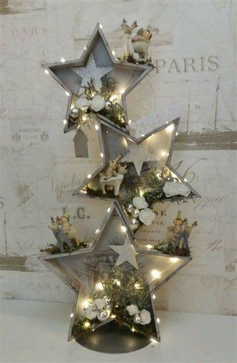 A Christmas Tree Made Out Of Metal Stars