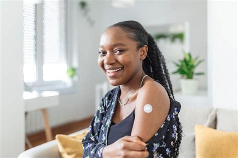 Premium Photo Portrait Of A Female Smiling After Getting A Vaccine