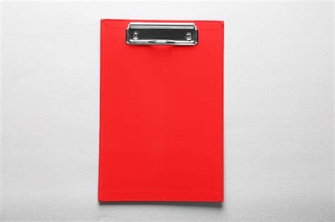 Premium Photo Red Clipboard On Light Background