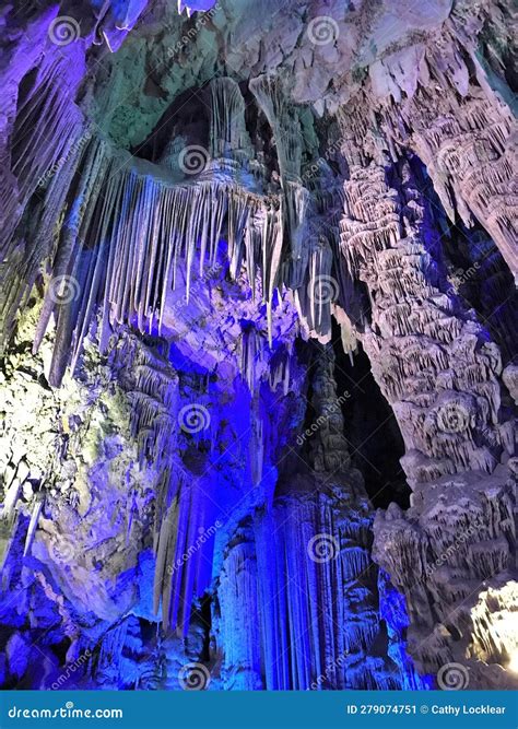 Illuminated Limestone Caves And Stalagmite Formations In St. Michael's