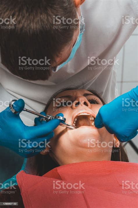 Local Anesthesia The Dentist Uses A Carpal Syringe Introducing Local