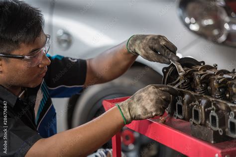 Auto Mechanic Using Feeler Gauge Set The Car Valve Stock Photo Adobe