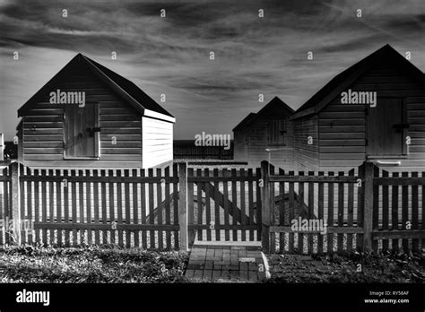 Dramatic Beach Huts Stock Photo Alamy