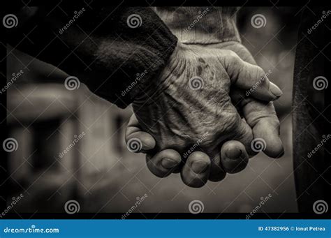 Old Couple Holding Their Hands Stock Photo - Image of sepia, black ...