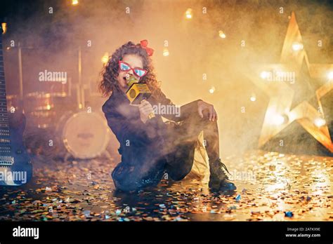 Beautiful Girl With Curly Hair Wearing Leather Jacket Red Sunglasses