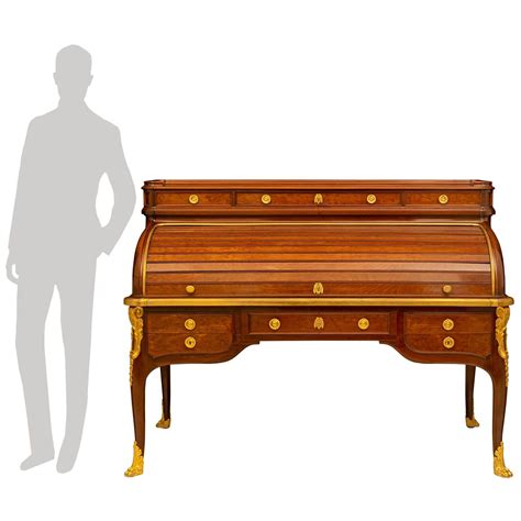 A French Th Century Transitional St Mouchet Mahogany And Ormolu