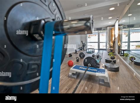 Fitness studio and gym with equipment Stock Photo - Alamy