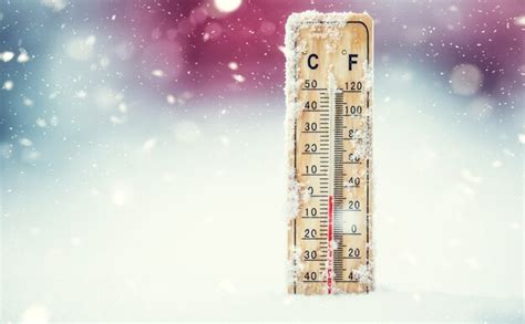 Premium Photo Thermometer On Snow Shows Low Temperatures In Celsius