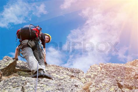 Lone Male Mountain Climber On Summit Stock Image Colourbox