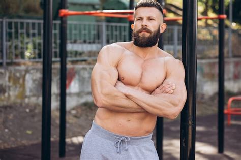 Premium Photo Handsome Bearded Bodybuilder Man With Perfect Muscular