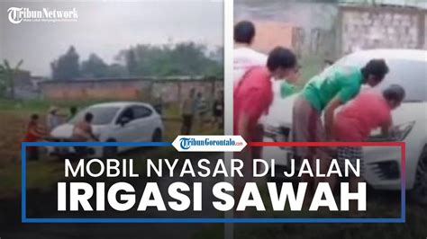 Viral Video Mobil Tersesat Di Sebuah Jalan Irigasi Sawah Akibat Ikuti