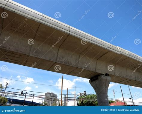 The View Under A Rail Bridge For The Hart Skyline In Pearlridge