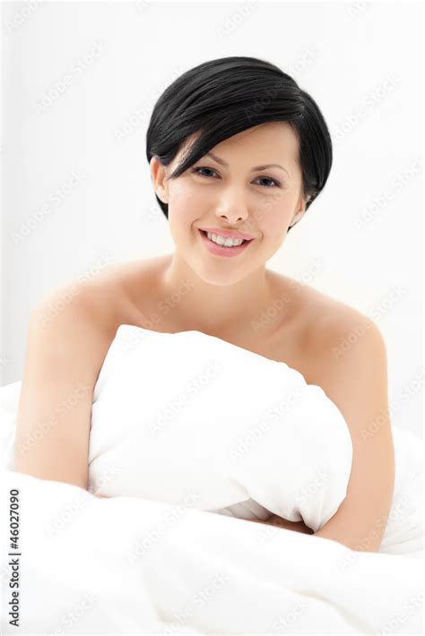 Halfnaked Woman Hugs The Eiderdown Isolated On White Background Stock