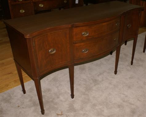 Inlaid serpentine front mahogany Hepplewhite sideboard