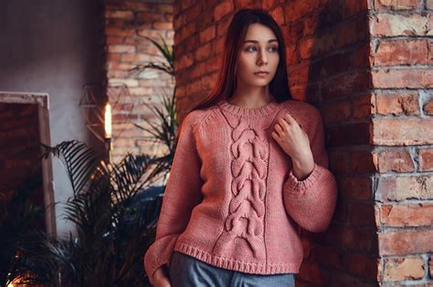 Free Photo Portrait Of A Beautiful Charming Brunette Dressed In Stylish Clothes Leaning