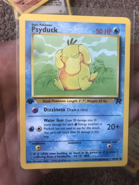 Psyduck 65 82 1st Edition NM Near Mint Team Rocket Non Holo Pokemon