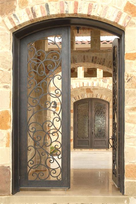 Two Wrought Iron Doors From Iron Doors Arizona Create A Memorable And Grand Entrance Irondoor