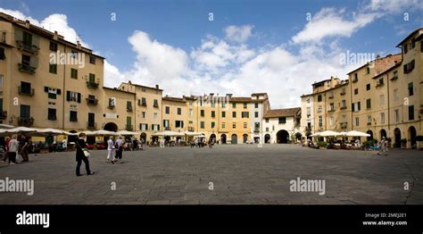 The Famous Round Square Piazza Dell Anfiteatro In The City Of Lucca