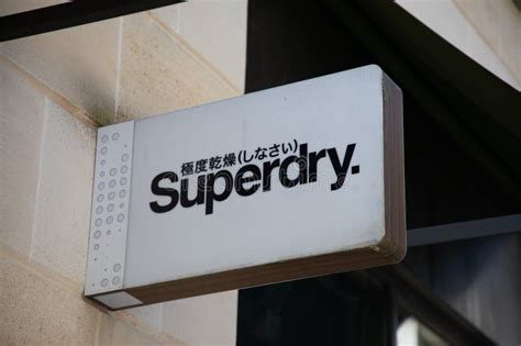 Superdry Logo Brand and Text Sign on Wall Facade Storefront Fashion ...