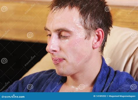 Guy dripping with sweat stock photo. Image of pensive - 14189202