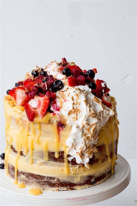 Lemon Coconut Berry Layer Cake With Lemon Curd And Torched Meringue