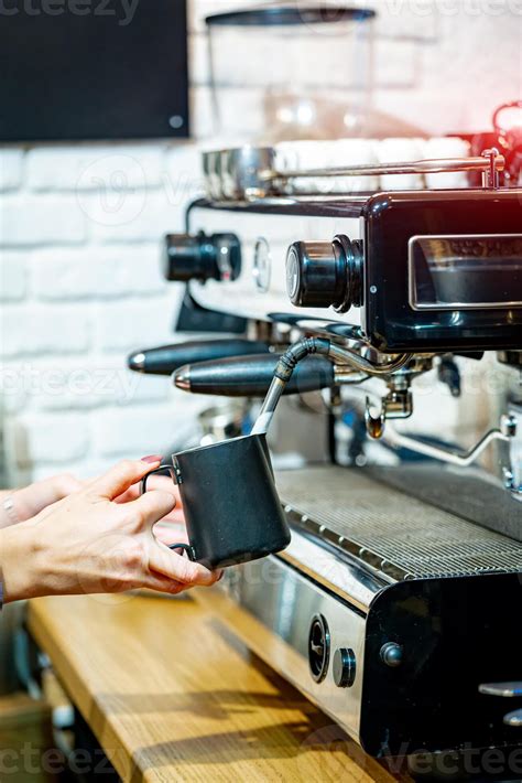 Coffee making with special professional machine. Pouring from coffee