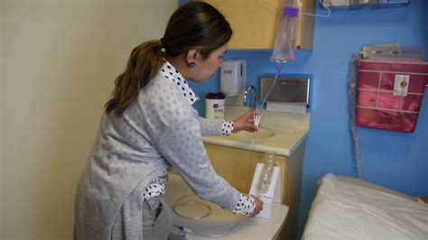 Nurse Administers Enema