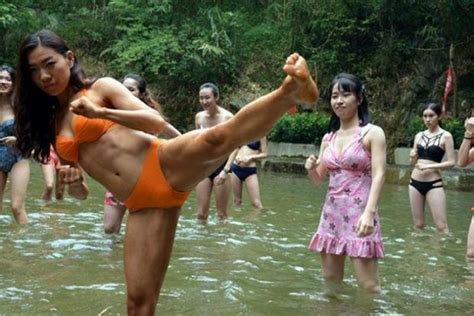 Bikini Lifeguards At China Rafting Attraction Train With Shaolin