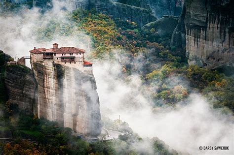 Clouds Roll Past The Cliff Top Monastery Of Rousanou In Meteora Greece