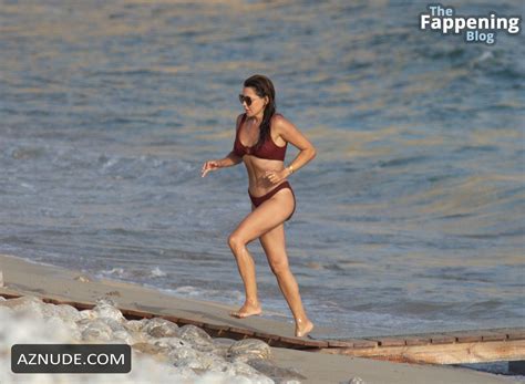 Danielle Bux Flaunts Her Sexy Curves In A Burgundy Bikini In Ibiza AZNude