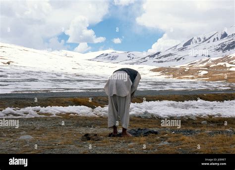 Pakistan Religion Islamic Muslim Praying On The Snow Covered Border