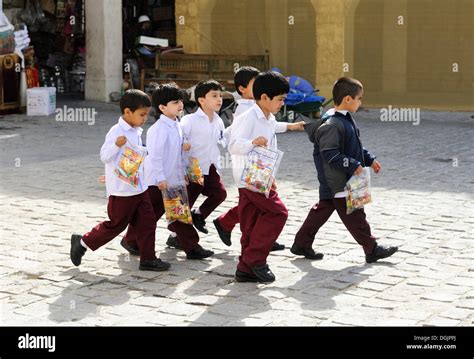 School children wearing school uniforms, Doha, Qatar, Arabian Stock ...