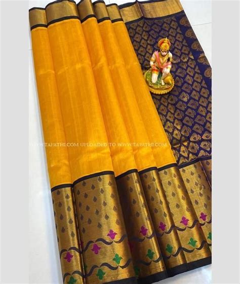 Mango Yellow And Navy Blue Color Kuppadam Pattu Handloom Saree With