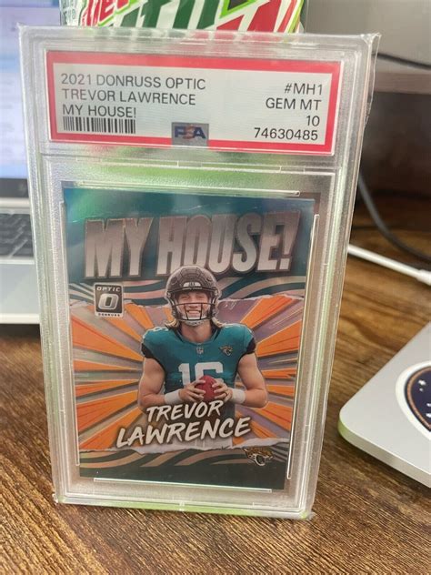 2021 Panini Donruss Optic Trevor Lawrence My House Holo Rookie PSA 10