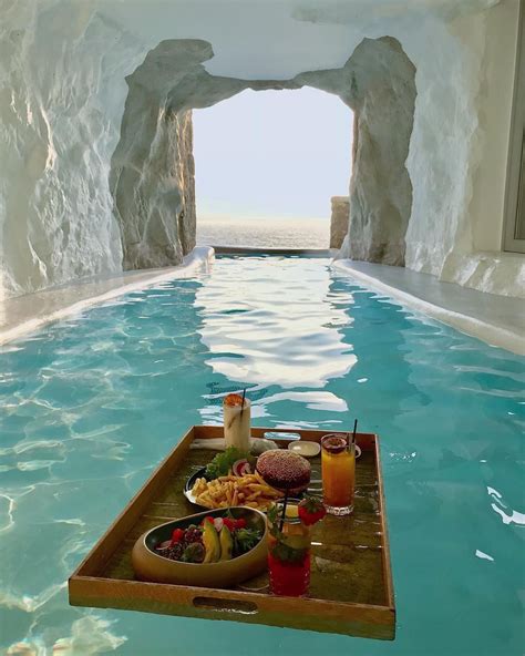 This cave pool in mykonos greece – Artofit