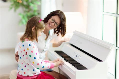 Child Playing Piano. Kids Play Music Stock Image - Image of little ...