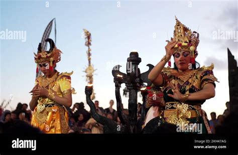 Two women with bright makeup and beautiful costumes dance Kecak dance. Bali Stock Video Footage ...