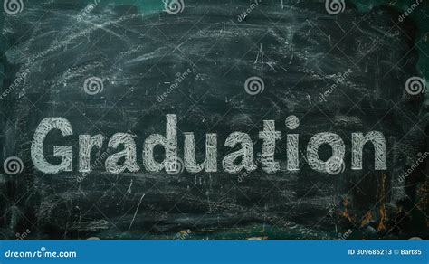 The Word Graduation Boldly Written In Chalk On A Blackboard