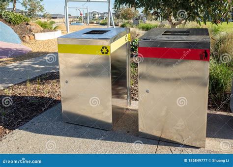 A Recycle Bin And A General Waste Placed Outdoor In A Children`s