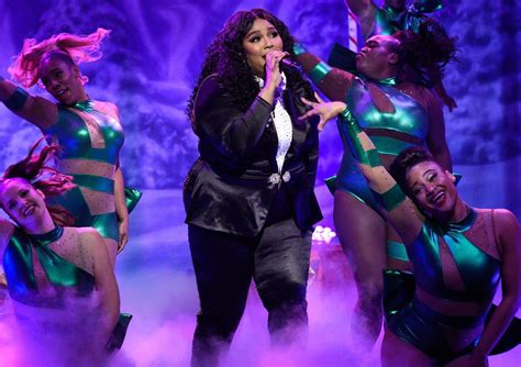 Lizzo Shows Butt In Sheer Tuxedo During Snl Performance