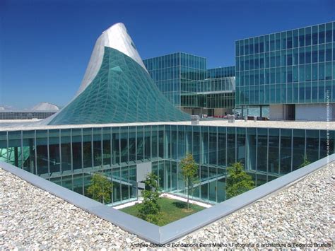 An Image Of A Building That Looks Like It Is Made Out Of Glass And Stone