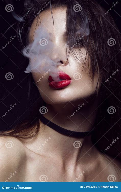 Beautiful Brunette Girl With Bright Makeup Red Lips Smoke From Mouth Beauty Face Stock Image