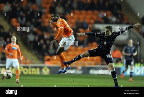 Blackpool S Ricardo Fuller Left And Millwall S Shane Lowry Battle For