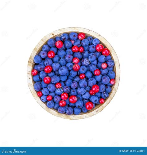 Bowl Of Blueberries And Cranberries On White Background Stock Photo