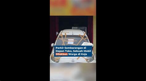 Parkir Sembarangan Di Depan Toko Sebuah Mobil Dilakban Warga Di Koja