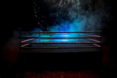 Empty Boxing Ring With Red Ropes For Match In The Stadium Arena