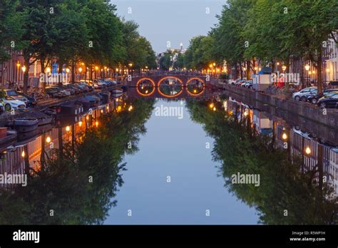 Night City View Of Amsterdam Canal And Bridge Stock Photo Alamy