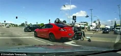 Dashcam Captures Dramatic Moment Car Smashes Into A Traffic Light Pole