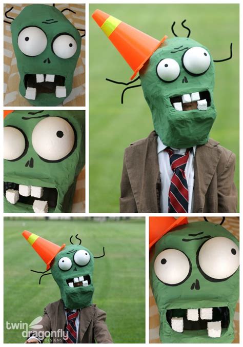 Four Different Pictures Of A Man Wearing A Green Mask With An Orange Cone On His Head